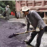 我为群众办实事 社区修路暖人心