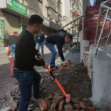 旧改提质暖民心 拆除违建保安全