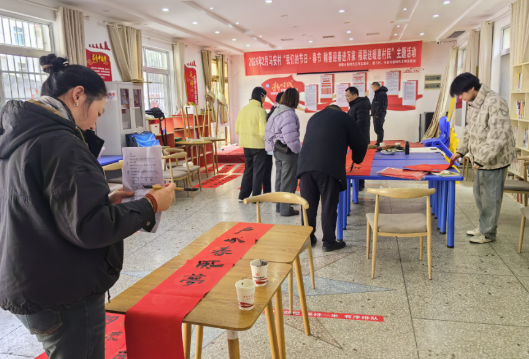 翰墨迎春进万家 福联送暖惠村民——郭镇乡马安村开展“我们的节日·丙午马年送对联下乡”主题活动