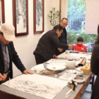 【新时代文明实践在醴陵】九位书画名家现场挥毫义卖 超万元善款为老人送暖