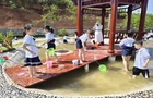 泥鳅戏水，童心飞扬——宁乡市玉潭街道实验小学开展心理治愈角抓泥鳅活动