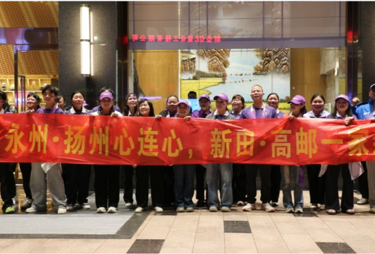 扬州高邮队顺利抵新获球迷热情迎接