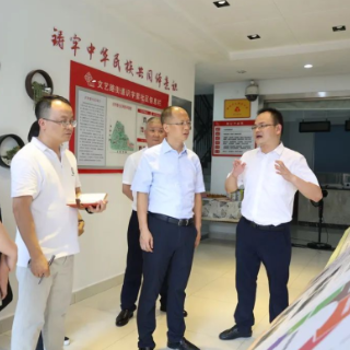 周春晖调研网格化社会治理工作
