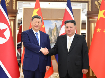 习近平同金正恩举行会谈