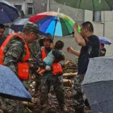 迎战“格美”｜抗洪前线夫坚守  后方妻儿幸得救