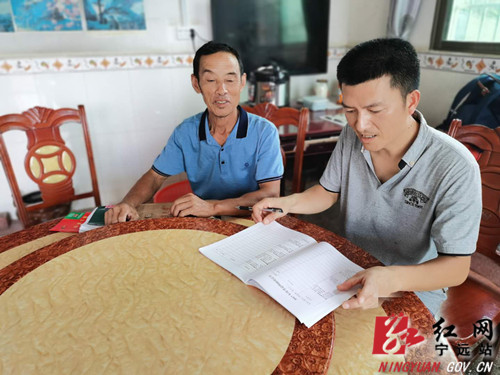 宁远：脱贫路上党旗红 抓好党建促双赢_副本500.jpg