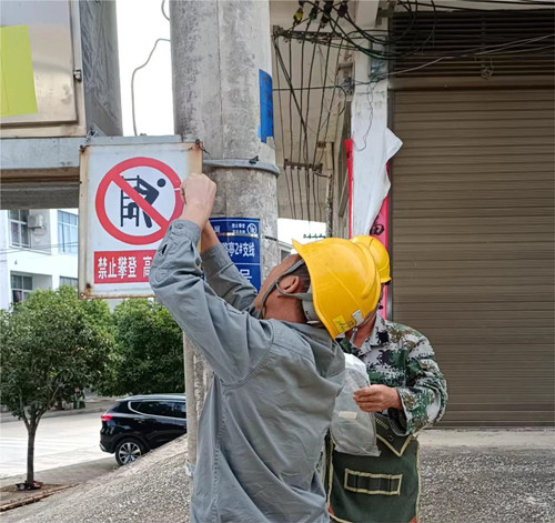 宁远：加装补齐杆号牌  给安全上“锁”_副本500.jpg
