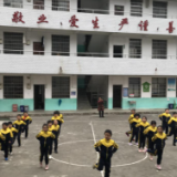 双江新庄小学举行《你笑起来真好看》韵律操比赛